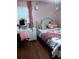 Charming bedroom with hardwood floors and a comfortable bed at 2479 Kingsland Dr, Dunwoody, GA 30360