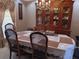 Formal dining room with a large table, chairs, and a hutch at 2479 Kingsland Dr, Dunwoody, GA 30360