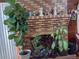 Brick fireplace with various plants and decorations at 2479 Kingsland Dr, Dunwoody, GA 30360