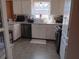 Updated kitchen with white cabinets and granite countertops at 2479 Kingsland Dr, Dunwoody, GA 30360