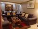 Living room with two sofas, a coffee table, and a view into the dining room at 2479 Kingsland Dr, Dunwoody, GA 30360
