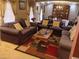Living room with two sofas, a coffee table, and a view into the dining room at 2479 Kingsland Dr, Dunwoody, GA 30360