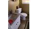 Bathroom featuring vanity with granite countertop, toilet with a bidet, and a small window at 2479 Kingsland Dr, Dunwoody, GA 30360
