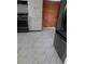 Kitchen area with stainless steel appliances and view of dining room at 2479 Kingsland Dr, Dunwoody, GA 30360