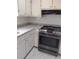 Kitchen featuring stainless steel oven and white cabinets at 2479 Kingsland Dr, Dunwoody, GA 30360