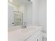 Bathroom featuring a vanity with white cabinets, a modern sink, and a shower in the mirror's reflection at 3256 Durston Ct, Dacula, GA 30019
