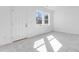 Bright bedroom offers carpet, two windows providing ample natural light, and neutral walls at 3256 Durston Ct, Dacula, GA 30019