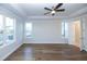 Bright bedroom with hardwood floors and ample natural light at 517 Pearl St, Cumming, GA 30040