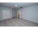 Spacious bonus room with carpet and neutral wall colors at 517 Pearl St, Cumming, GA 30040