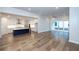 Open concept kitchen with island and stainless steel appliances at 517 Pearl St, Cumming, GA 30040