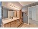 Bathroom with single sink and built-in cabinets at 947 Pinbrook Dr, Lawrenceville, GA 30043