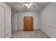 Bedroom with wood cabinet and access to bathroom at 947 Pinbrook Dr, Lawrenceville, GA 30043