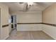 Bedroom with carpet, ceiling fan, and access to bathroom at 947 Pinbrook Dr, Lawrenceville, GA 30043