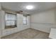 Bright bedroom with built-in cabinets and window seat at 947 Pinbrook Dr, Lawrenceville, GA 30043