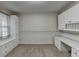 Bedroom with built-in desk and cabinets at 947 Pinbrook Dr, Lawrenceville, GA 30043