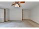 Spacious bedroom with a ceiling fan and window at 947 Pinbrook Dr, Lawrenceville, GA 30043