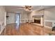 Gathering room with hardwood floors and brick fireplace at 947 Pinbrook Dr, Lawrenceville, GA 30043