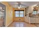 Kitchen with white cabinets and breakfast nook at 947 Pinbrook Dr, Lawrenceville, GA 30043