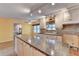 Open kitchen with large island and white cabinets at 947 Pinbrook Dr, Lawrenceville, GA 30043