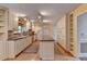 Kitchen with an island and white cabinets at 947 Pinbrook Dr, Lawrenceville, GA 30043