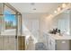 Elegant bathroom featuring double sinks and a large mirror at 131 Bennett Farm Dr, Loganville, GA 30052