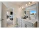 Main bathroom with double vanity and access to bedroom at 131 Bennett Farm Dr, Loganville, GA 30052
