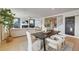 Bright dining area with modern table and chairs near kitchen at 131 Bennett Farm Dr, Loganville, GA 30052