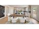 Kitchen and dining area with modern table and chairs at 131 Bennett Farm Dr, Loganville, GA 30052