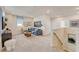 Spacious game room with a sectional sofa, media center, and a view of the landing at 131 Bennett Farm Dr, Loganville, GA 30052