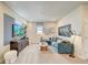 Cozy game room features a comfortable sectional sofa and a large TV at 131 Bennett Farm Dr, Loganville, GA 30052