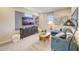 Relaxing game room with sectional sofa, TV, and stylish decor at 131 Bennett Farm Dr, Loganville, GA 30052
