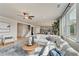 Spacious living area with sectional sofa and views into kitchen and dining area at 131 Bennett Farm Dr, Loganville, GA 30052