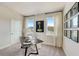 Spacious home office with two windows and a desk at 131 Bennett Farm Dr, Loganville, GA 30052