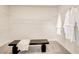 Spacious walk-in closet with ample shelving and bench at 131 Bennett Farm Dr, Loganville, GA 30052