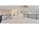 Loft overlooking main living area with ceiling fan at 2617 Jupiter Sw Dr, Powder Springs, GA 30127