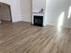 Gathering room with hardwood floors and fireplace at 1238 Polk Xing, Mcdonough, GA 30252