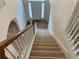 View of staircase leading to the upper level at 1238 Polk Xing, Mcdonough, GA 30252