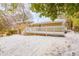 Large backyard with a deck and snow-covered ground at 2617 Miriam Ln, Decatur, GA 30032