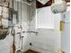 Unfinished basement area with water heater and electrical panel at 2617 Miriam Ln, Decatur, GA 30032