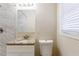 Updated bathroom featuring granite countertop and marble tile at 2617 Miriam Ln, Decatur, GA 30032