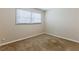 Simple bedroom with neutral walls and carpeted floors at 2617 Miriam Ln, Decatur, GA 30032