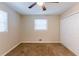 Bright bedroom with neutral walls, carpet flooring, and ample closet space at 2617 Miriam Ln, Decatur, GA 30032