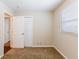Bright bedroom featuring neutral walls and a large closet at 2617 Miriam Ln, Decatur, GA 30032