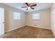 Bright bedroom with neutral walls and brown carpeting at 2617 Miriam Ln, Decatur, GA 30032