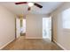 Spacious bedroom with ensuite bathroom and ceiling fan at 2617 Miriam Ln, Decatur, GA 30032