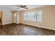 Spacious living room with hardwood floors and ceiling fan at 2617 Miriam Ln, Decatur, GA 30032