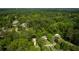 Aerial view showcasing a tree-lined neighborhood with various houses at 3840 Wieuca Ne Ter, Atlanta, GA 30342