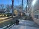 Fenced backyard with patio and trampoline at 4626 Midridge Dr, Norcross, GA 30093