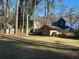 Large backyard with storage shed and lawn mower at 4626 Midridge Dr, Norcross, GA 30093