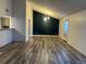Bright dining room with wood-look floors and a chandelier at 4626 Midridge Dr, Norcross, GA 30093